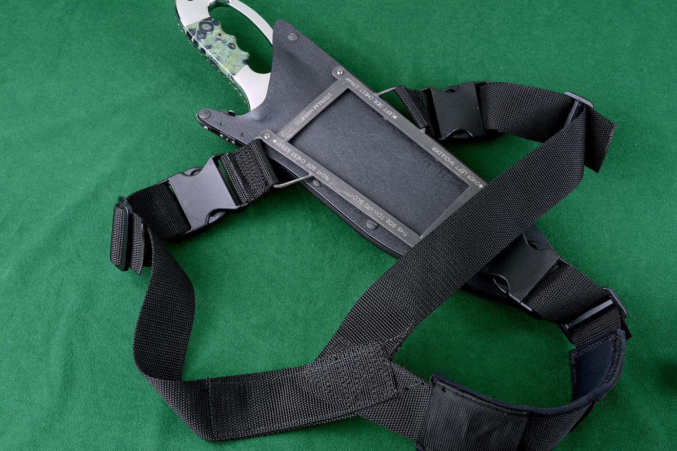 "Ananke" custom tactical knife, module frame for sternum harness shown attached to sheath