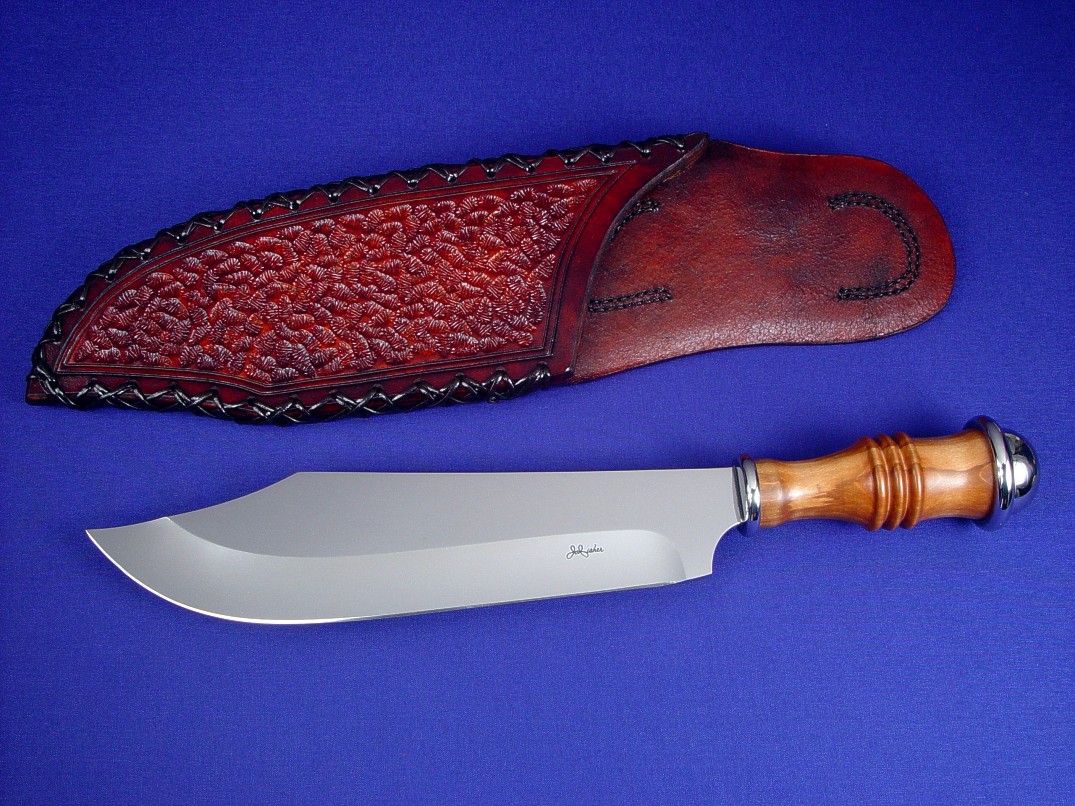 "Andrimne" Chef's Master Knife, obverse side view in 440C high chromium stainless steel blade, 304 stainless steel guard ferrule and pommel ferrule, Peach hardwood turned handle, hand-stamped, hand-laced leather sheath