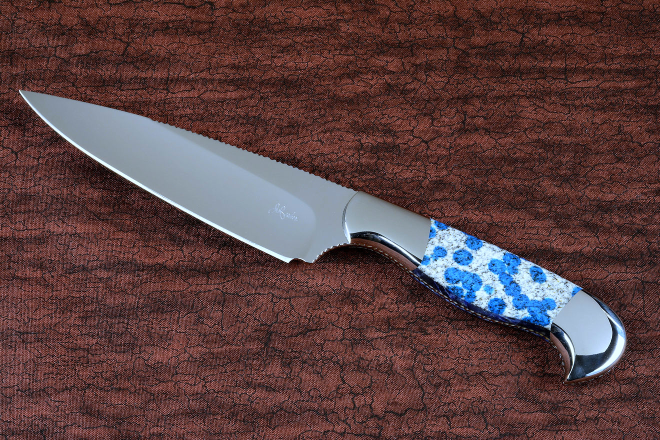 "Andromeda" obverse side view in T3 deep cryogenically treated CPM 154CM powder metal technology high molybdenum stainless steel blade, 304 stainless steel bolsters, K2 Azurite Granite gemstone handle, hand-carved leather sheath inlaid with blue rayskin
