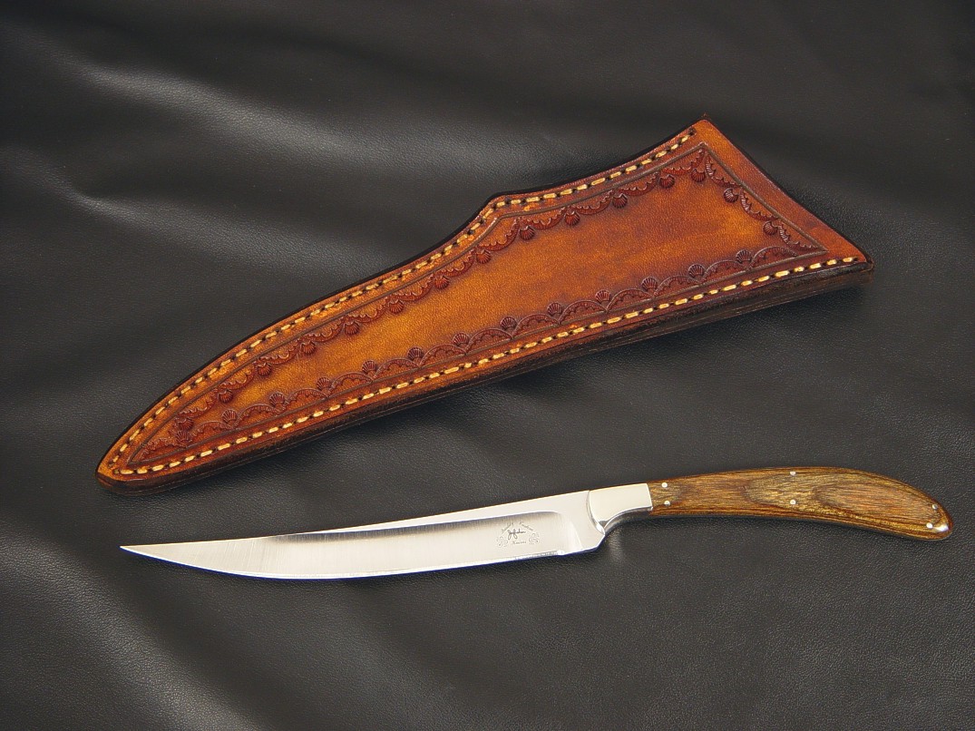 "Boning Knife" obverse side view in 440C high chromium stainless steel blade, 304 stainless steel bolsters, Dymondwood(stabilized birch laminate) handle, hand-stamped leather sheath