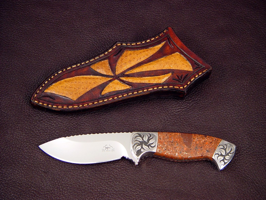 "Chama" obverse side view in 440C high chromium stainless steel blade, hand-engraved low carbon steel bolsters, copper ore, hecla, calumet handle, Emu skin inlaid in hand-carved leather sheath