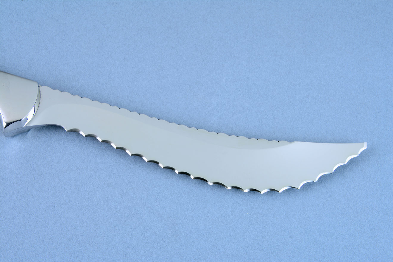 "Kineau Magnum" reverse side blade view and detail, showing hollow ground serrations and blade geometry