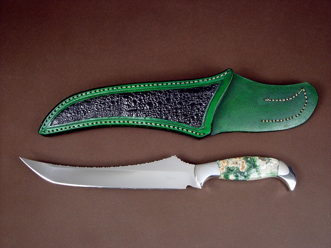 "Dagon" fillet, boning, carving, chef's, collector's knife, obverse side view in 440C high chromium stainless steel blade, 304 stainless steel bolsters, Green Orbicular Jasper gemstone handle, frog skin inlaid in hand-carved leather sheath