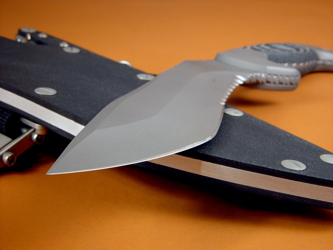 "Kneph" obverse side view in ATS-34 high molybdenum stainless steel blade, 304 stainles steel bolsters, Black and gray G10 fiberglass epoxy composite handle, locking kydex, aluminum, stainles steel sheath with full accessory package