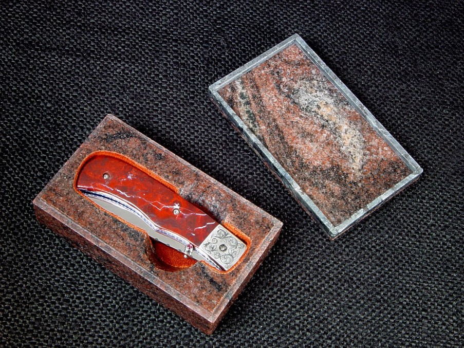 "Sadr" liner lock folding knife: 440C high chromium stainless steel blade, hand-engraved 304 stainless steel bolsters, jasper gemstone handle, anodized titanium liners, granite case