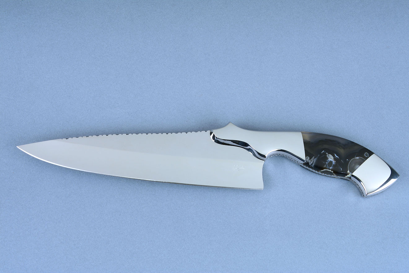 "Sirona" professional chef's knife, obverse side view. Deeply hollow ground blade is high alloy advanced stainless steel