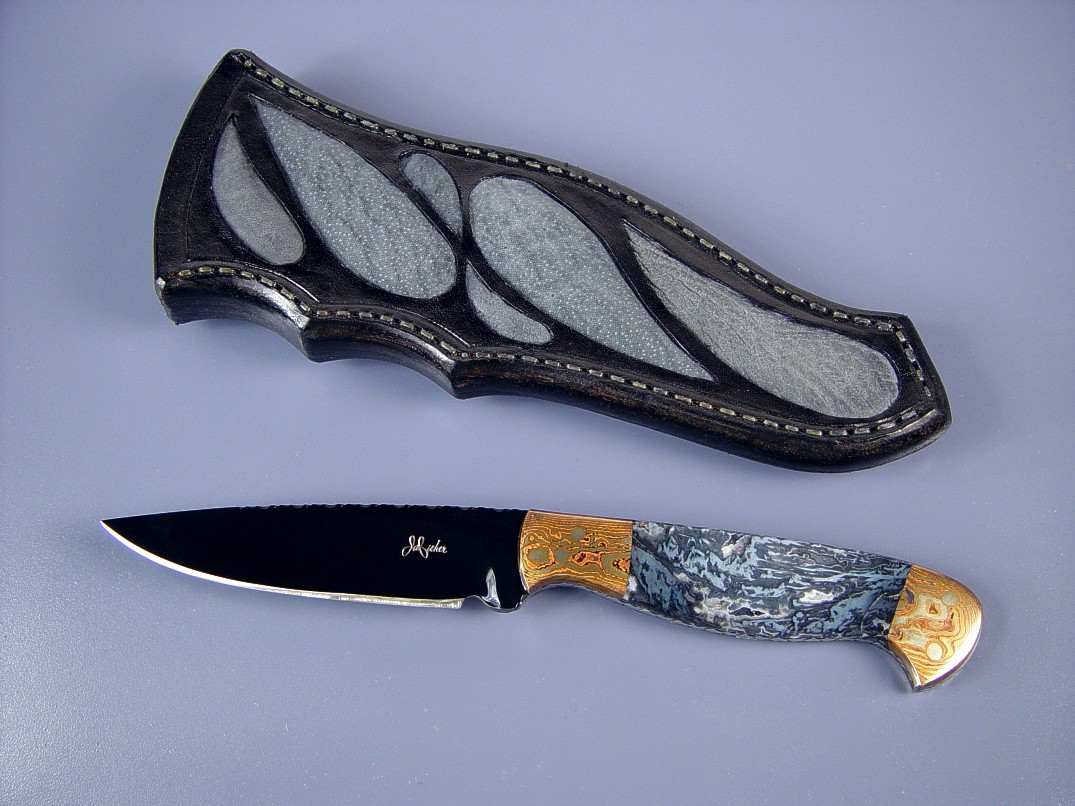 Fine Handmade Knife: "Tarazed" obverse side view: blued O-1 oil  hardening tool steel blade, Mokume Gane bolsters, Agate gemstone handle, Sharkskin inlaid in hand-carved leather sheath