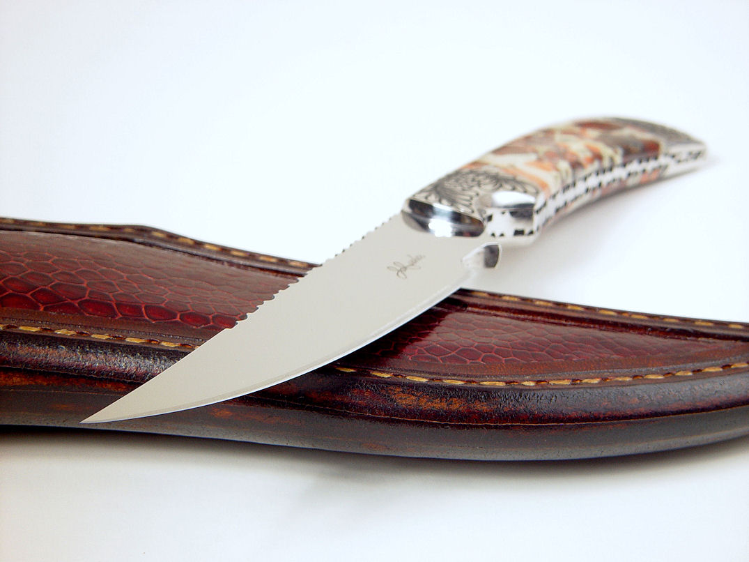 "Trifid" obverse side view in 440C high chromium stainless steel blade, hand-engraved 304 stainless steel bolsters, Brecciated Jasper gemstone handle, Ostrich leg skin inlaid in hand-carved leather sheath