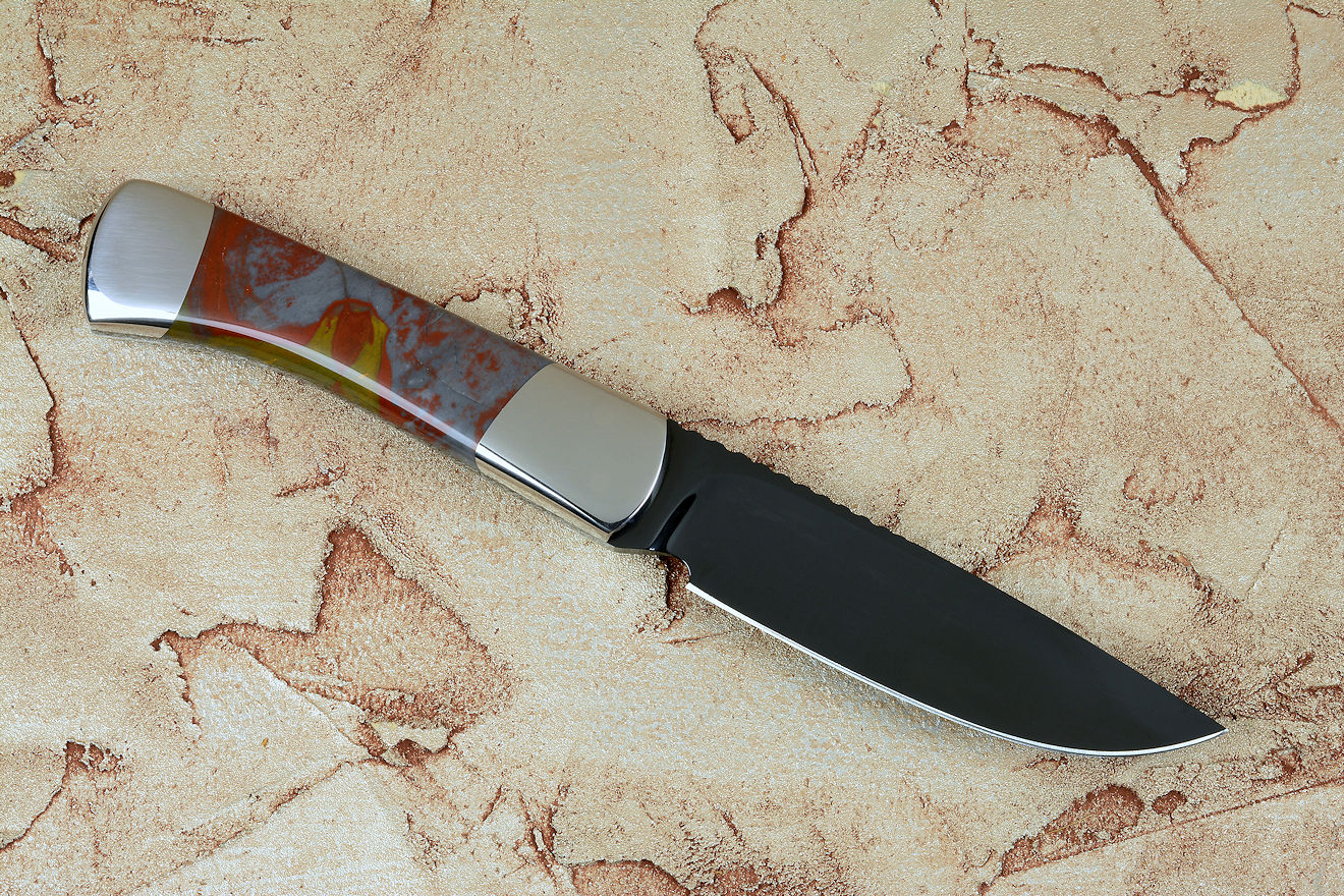 "Zeta" reverse side view, in cryogenically treated O-1 high carbon tungsten vanadium tool steel blade, 304 stainless steel bolsters, Sunset Jasper gemstone handle, hand-carved leather sheath inlaid with black-gray rayskin