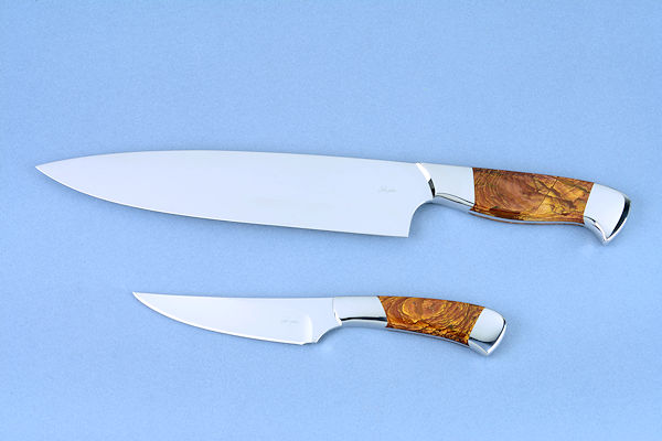 "Concordia and Talitha" fine handmade chef's knives, in stand view, in T3 cryogenically treated CPM154CM high molybdenum powder metal technology stainless steel blades, 304 stainless steel bolsters, Deschutes Jasper gemstone handles, stand of cherry hardwood, Deschutes Jasper gemstone, Delicatus Gold Granite