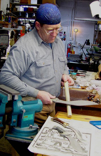 Sharpening the inside curve of a khukri blade, using a ceramic tube