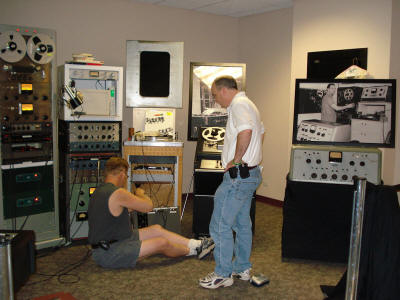 Jay working on compressor, Chase watching