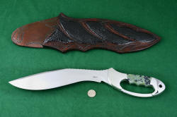 "Ananke" custom handmade fine khukri, size comparison with a United States quarter. This is a large knife, over 18" overall length