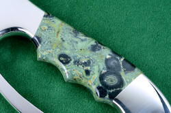 "Ananke" custom tactical, fine khukri knife, obverse side gemstone handle detail. Fossilized stromatolite cyanobacteria colony is the earliest fossil of a life form on earth, replaced by gemstone