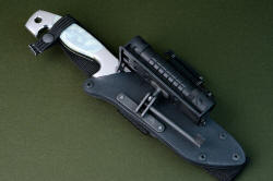 "Arctica" sheathed view. Sheath is the best combat sheath made, positively locking in all darkened stainless steel, anodized aluminum and kydex, completely waterproof