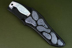 "Arctica" sheathed view. Sheath is distinctive, collector's grade, tough and durable in Frog skin inlaid in hardened leather shoulder