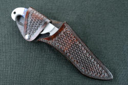 "Artcurus" with hand-tooled heavy leather sheath in bison brown basketweave leather with double row stitching and stainless steel snap flap retention