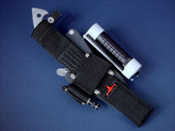"Ari B'Lilah", reverse side sheath view. Ultimate belt loop extender allows lower wear position on belt line, holds backup emergency led solitaire Maglite, diamond pad sharpener, is waterproof and durable.