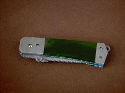 "Aries" liner lock folding knife, folded view. Knife is tight and solid in damascus stainless steel, titanium, and New Zealand Pounamu Nephrite Jade gemstone