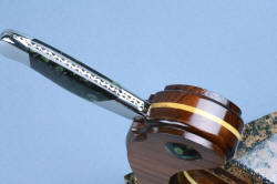 "Concordia" stand filework on knife handle view from above.