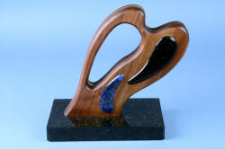 "Concordia" Custom Fine Chef's Knife, left side stand view, sculptural form in wood and gemstone