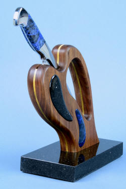 "Concordia" Custom Fine Chef's Knife. The form of the stand also services as a handle to move the stand.