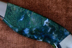 "Conodont" custom knife, obverse side gemstone handle detail, five power enlargement. Wonderous gemstone material is extremely solid despite the wide pattern variation within