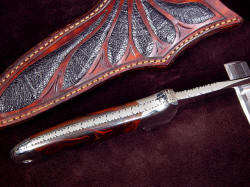 "Cygnus-Horrocks" spine edgework, filework detail. Spine is fully fileworked in deeply cut arrow pattern. Note wide bolster-supported thumb ramp