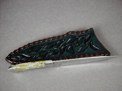 "Cygnus" handmade knife, spine edgework, filework detail. Note variable pattern filework, thin blade and tapered tang