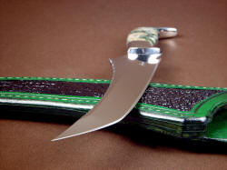 "Dagon" point view. Point is extremely sharp and thin, with hollow grinds and single bevel edges