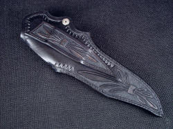 "Domovoi" black sheath rear view. Sheath back is hand carved in leaf motif even on belt loop