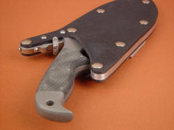 "Hooded Warrior" sheath mouth view. Sheath has welt-frame of corrosion-resistant, high strength aluminum alloy