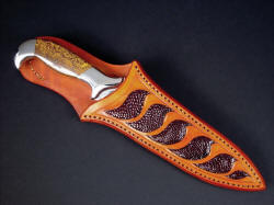 "Kapteyn" sheathed view. Sheath protects blade and owner, frames beautiful and striking gemstone handle scales