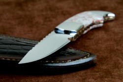 "Lacerta" fine handmade knife, point detail. Fine point is developed with deep hollow grind in thick spine
