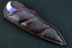 "Lethal Chance" sheathed view. Sheath is deep and protective, with large inlaid panels of Buffalo (American Bison) skin
