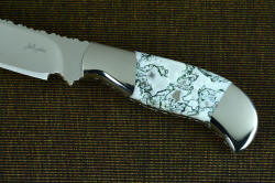 "Menkar" obverse side handle view. Handle is three-fingered and rests comfortably in the palm. 