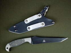 "Mercator" custom combat tactical knife, reverse side view. Note die-formed high strength aluminum belt loops which are reversible and can also be moved to the lower screws on the sheath body.