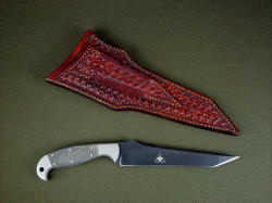 "Mercator" with leather sheath reverse side view. Sheath belt loop is thick and solid, all tooled.