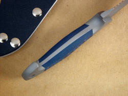 "Mercury Magnum" inside handle tang view. Note dovetailed bolsters to bed G10 handle material.