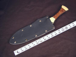 "Nasmyth-Marius" khukri, scaled view, in sheath. The large knife is easily accessible in the tough kydex sheath