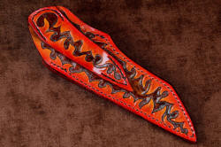 "Nishi" sheath back view. Sheath is fully tooled and hand-dyued throughout with graduated tone of flames and brown receding background