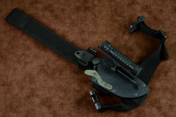 "Oculi" professional counterterrorism, tactical, working knife, shown with sheath mounted on Extra Length Belt Loop Extender wtih HULA mounted on sheath