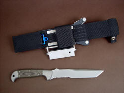 "PJLT" CSAR, Tactical knife, reverse side view. Ultimate sheath belt loop extender lowers position to more traditional placement on belt line, but is removable and replaceable with die-formed aluminum belt loops which are reversible