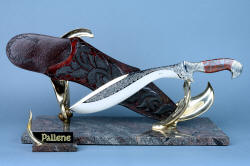 "Pallene" custom handmade knife sculpture, front view. High technology tool steel blade, old world process lost wax casting, inlays of rayskin in leather, granite classic base