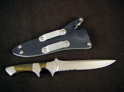 "Patriot" tactical combat knife, reverse side view. Note reversible die formed corrosion resistant aluminum belt loops on locking sheath
