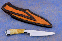 "Phact" reverse side view. Sheath has full panel inlays of Teju lizard to match color of fossil coral shown in this photo