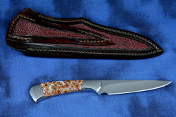 "Phact" fine handmade knife, reverse side view. Sheath back has full inlays of red rayskin including belt loop