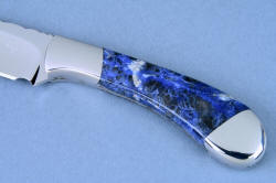 "Sanchez" fine custom handmade chef's knife, obverse side gemstone handle detail. This is a three power enlargement. The feldspar in the sodalite shows the silvery sheen of labradoressence light play 
