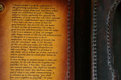 "Steak Knives," inside case showing pockets with knives, Romans 13 verse inside cover in engraved leather shoulder.