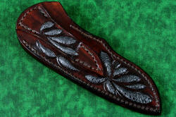 "Thuban" fine custom handmade knife, sheath back detail. 13 pieces of gray frog skin inlaid in hand-carved leather shoulder, stitched with brown nylon